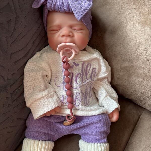 Photo of their Dollnest baby shared by Linda