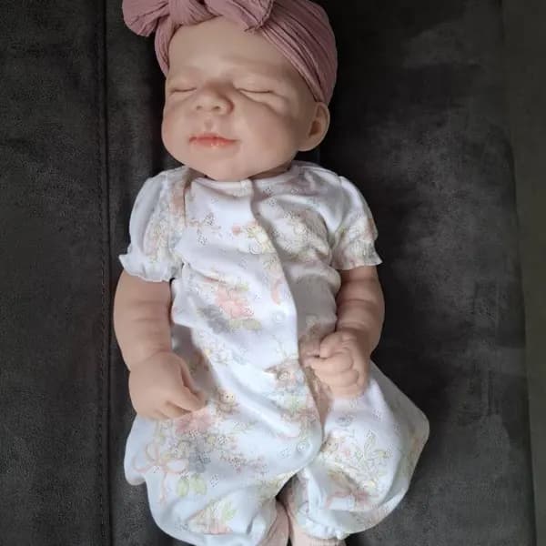Photo of their Dollnest baby shared by Debra