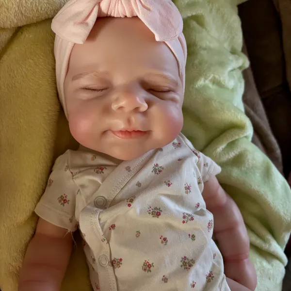 Photo of their Dollnest baby shared by Ewa