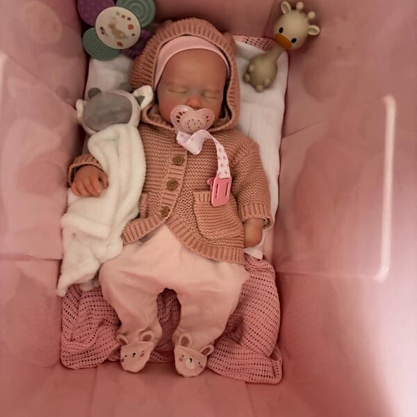 Photo of their Dollnest baby shared by Charlotte