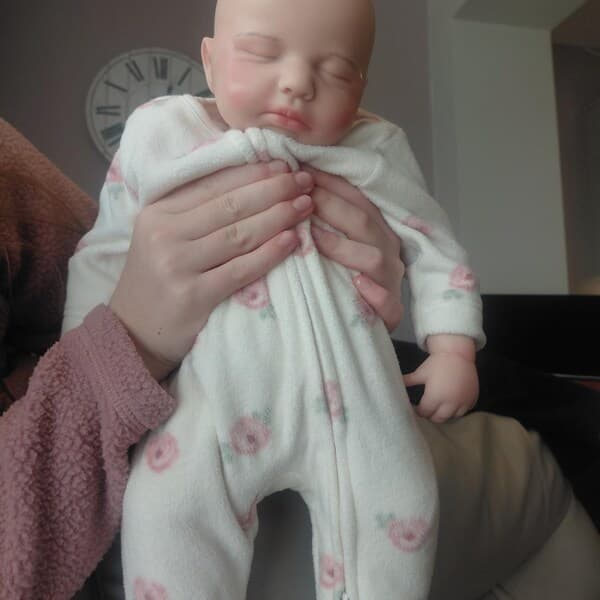Photo of their Dollnest baby shared by Sara