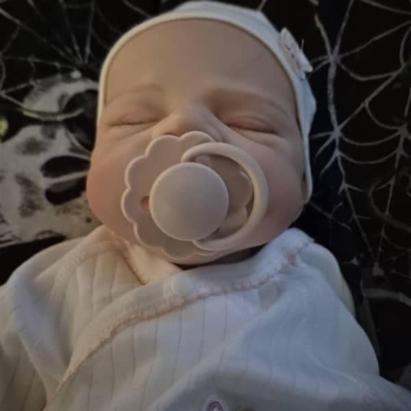 Photo of their Dollnest baby shared by Ruth