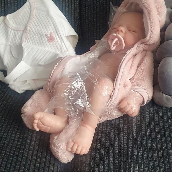 Photo of their Dollnest baby shared by Celia