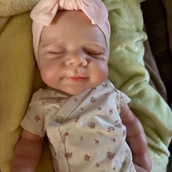 Photo of their Dollnest baby shared by Ewa
